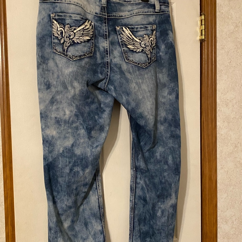 Distressed blue jeans